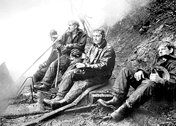 The Pulitzer photograph of four exhausted firemen. 