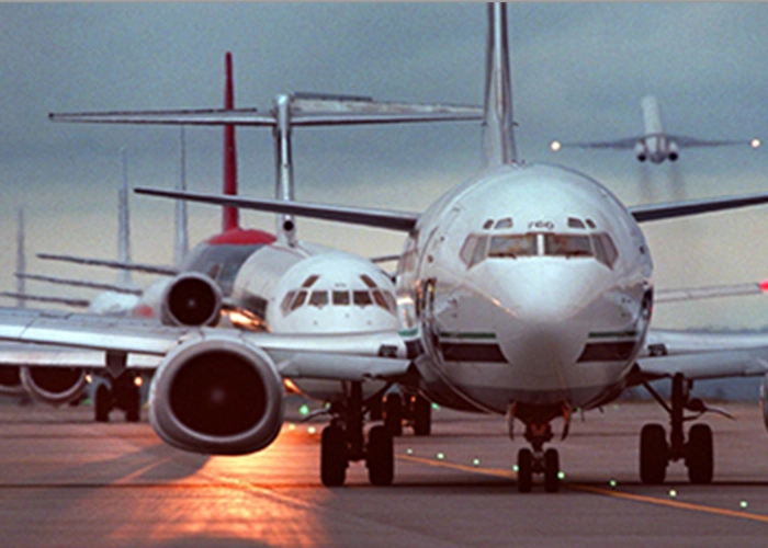 A Boeing 737 on the runway.